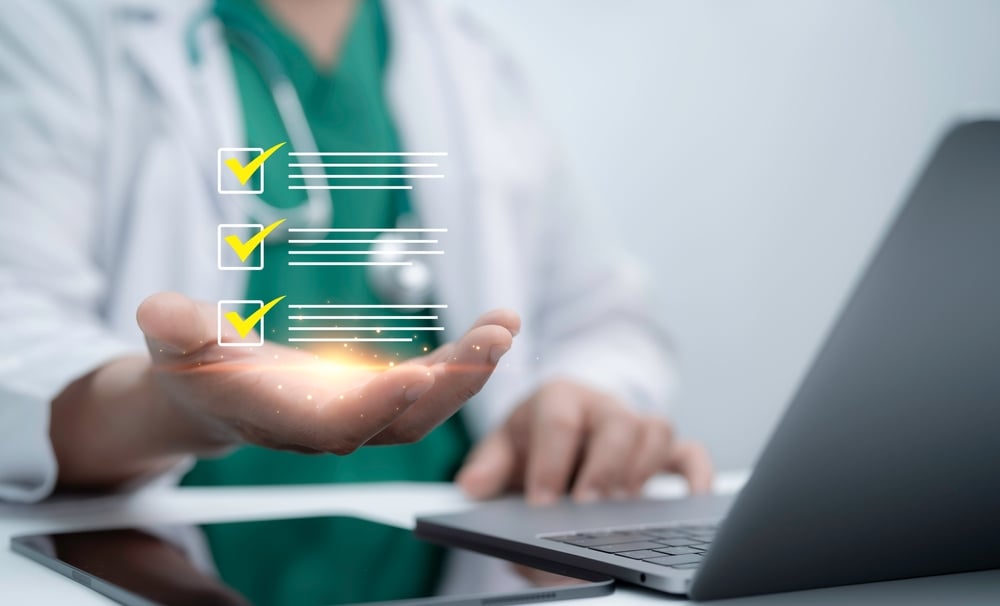 hand yellow check marks